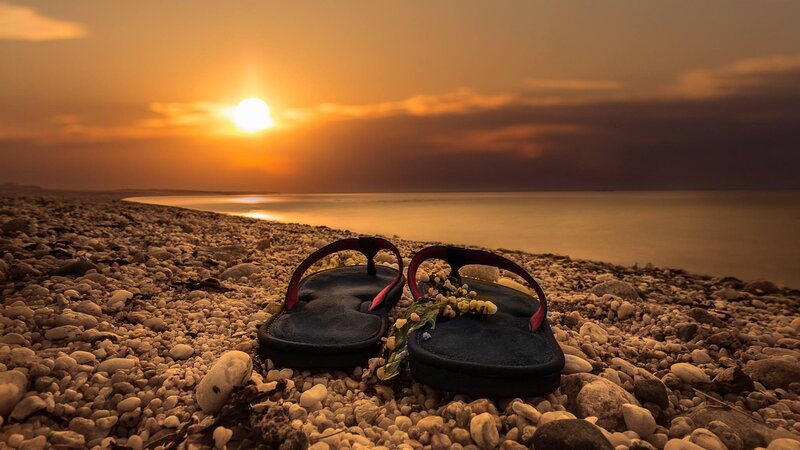 Flip-flops on Pebble Beach — Orange