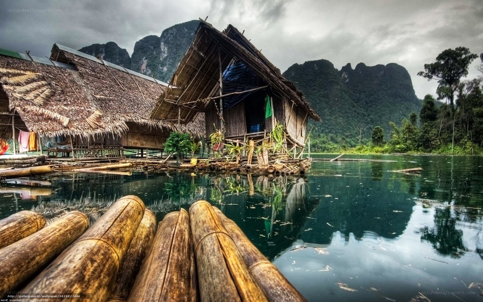 Floating bamboo huts on a lake