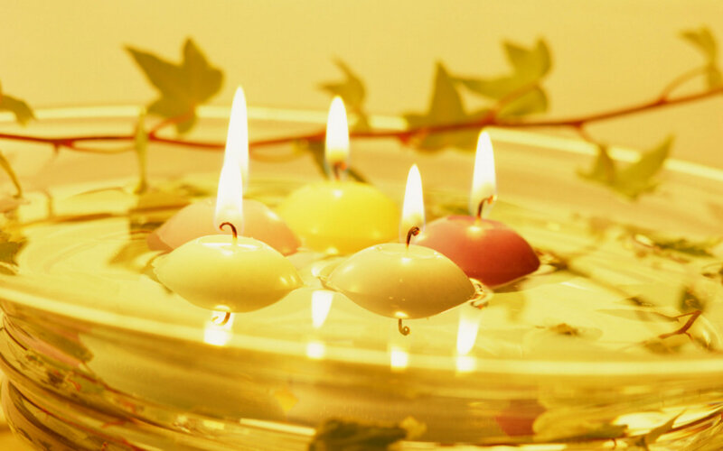 Floating Candles in Water — Yellow