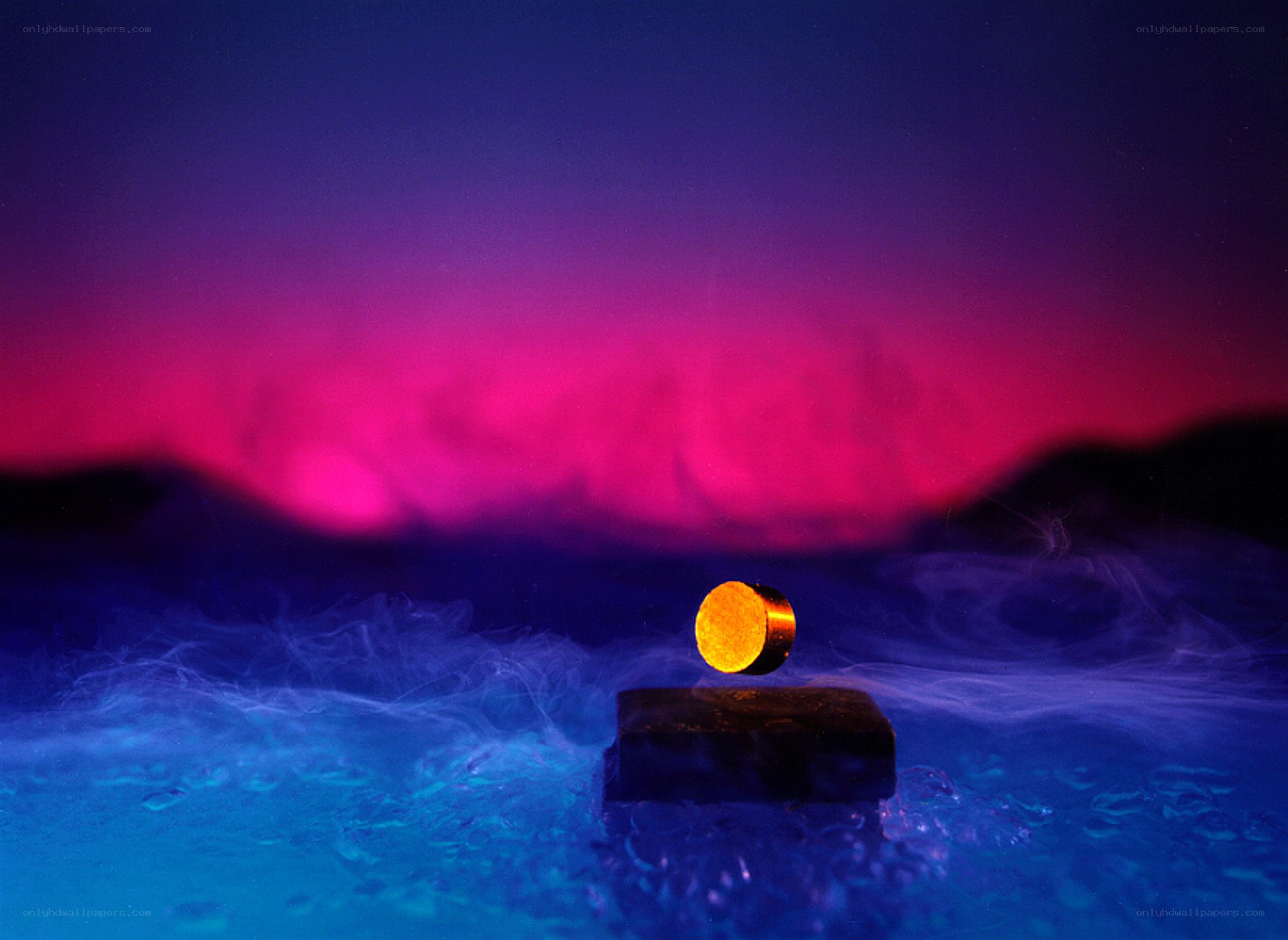 Floating golden object in mist