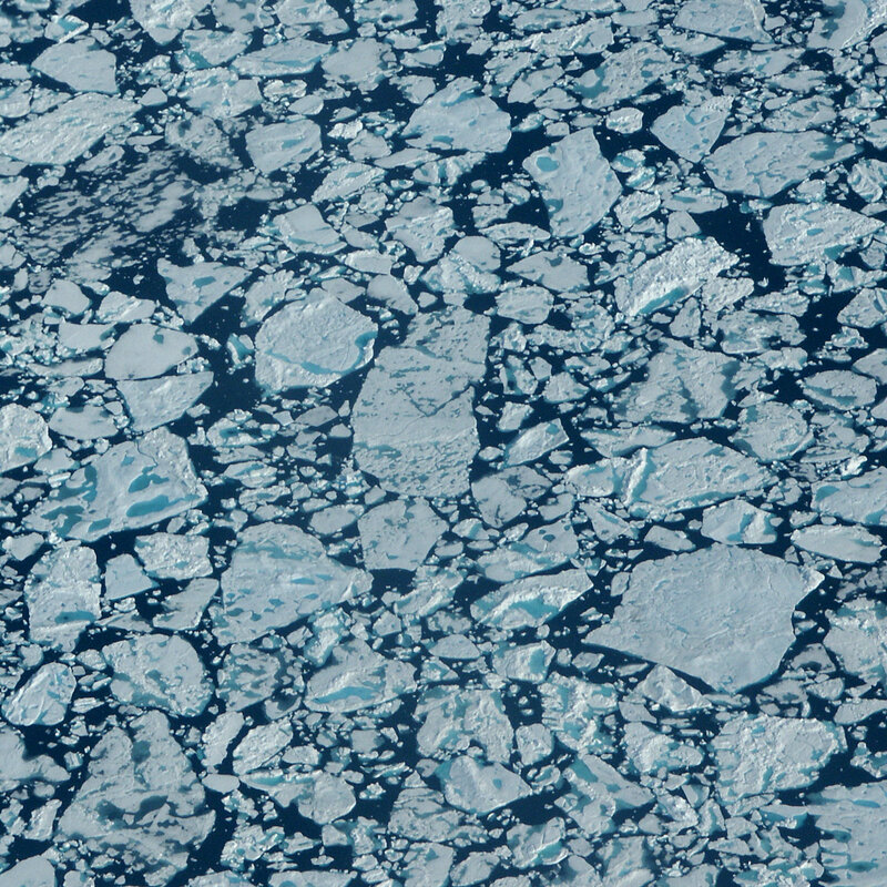 Floating ice chunks on water