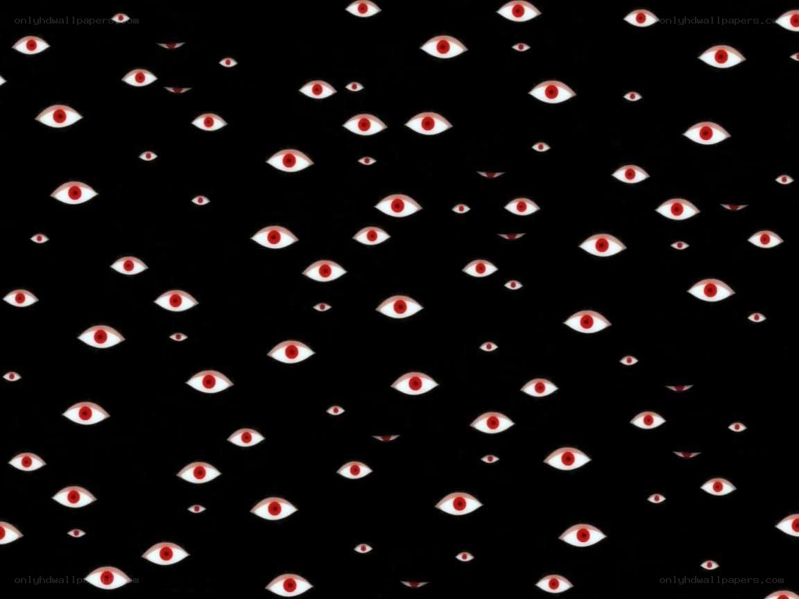 floating red eyes on black