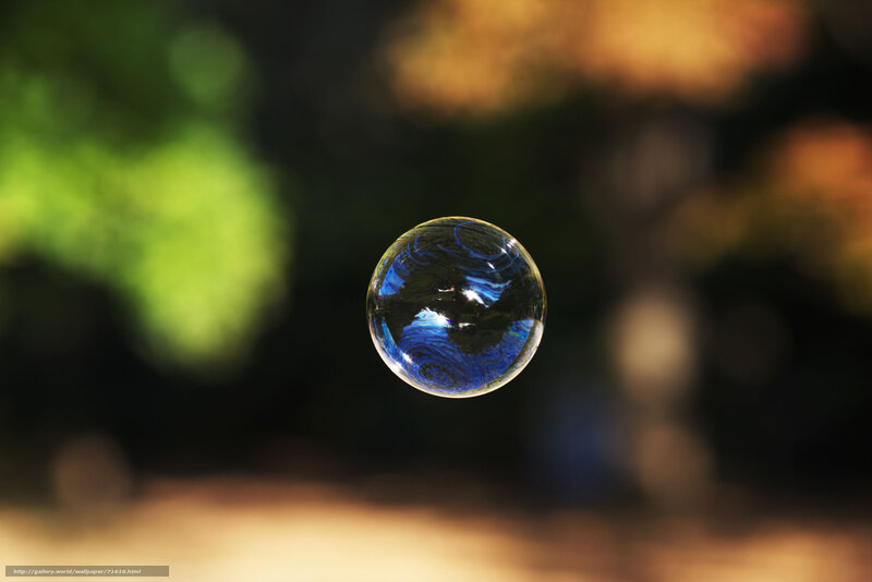 Floating soap bubble in sunlight