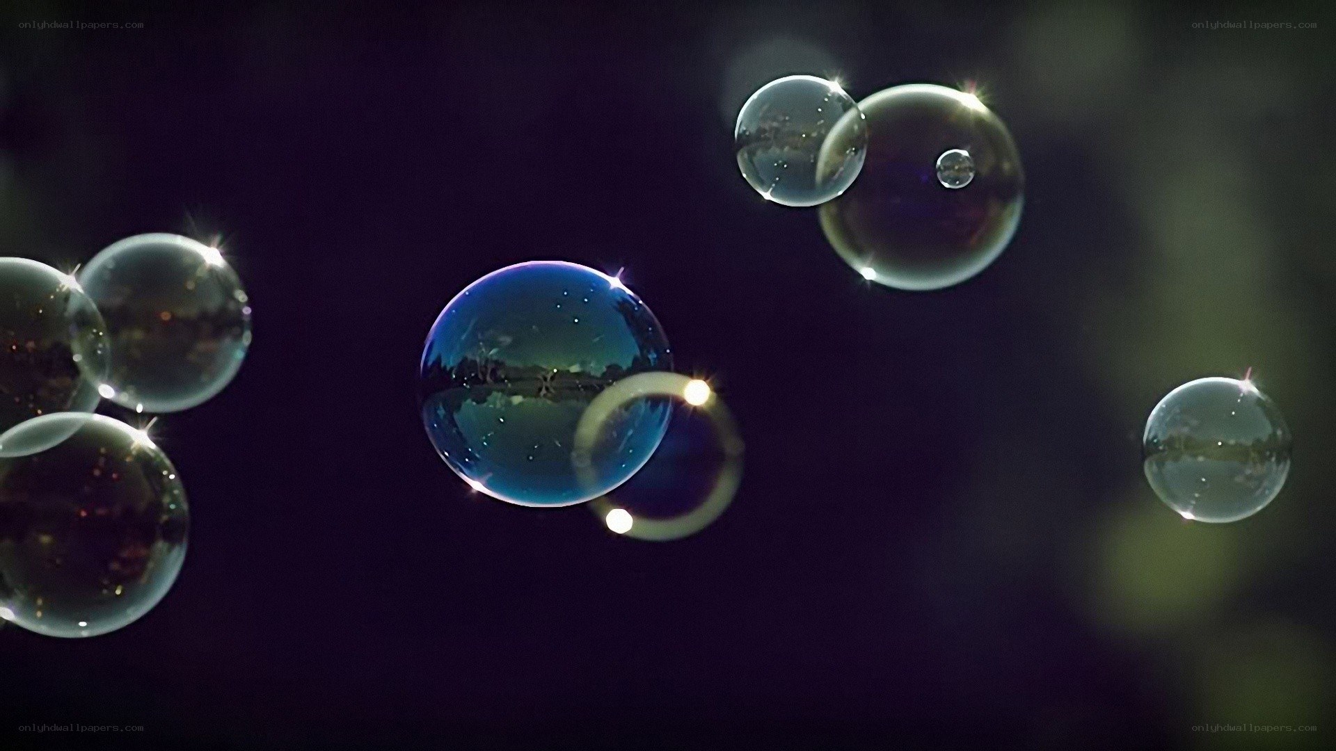 floating soap bubbles at night