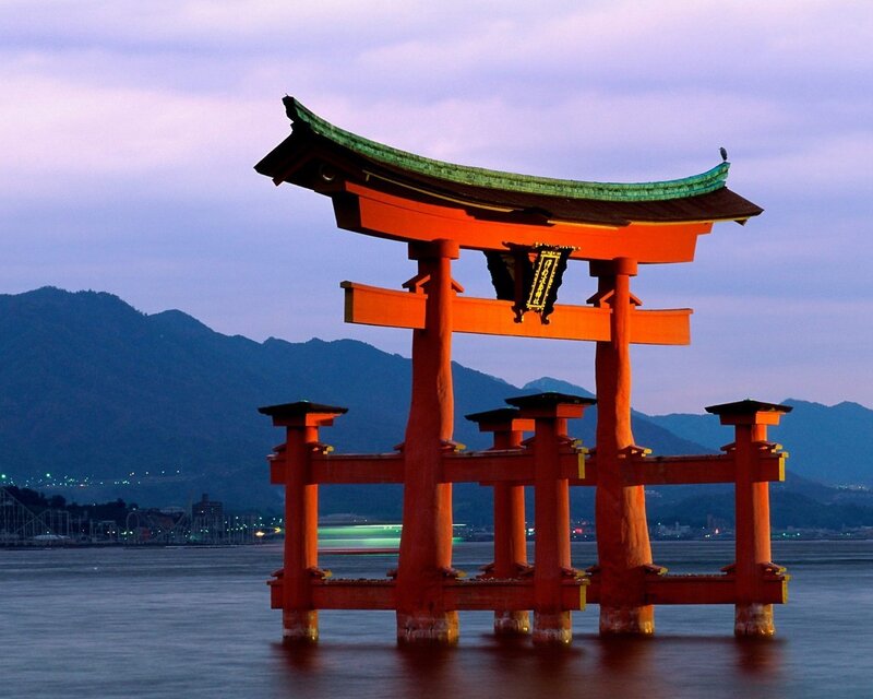 Floating torii gate at dusk