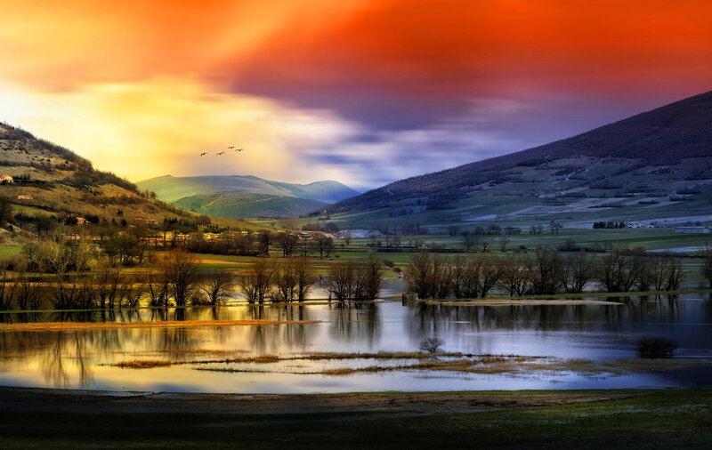 Flock of Birds over Lake — Orange, Dramatic