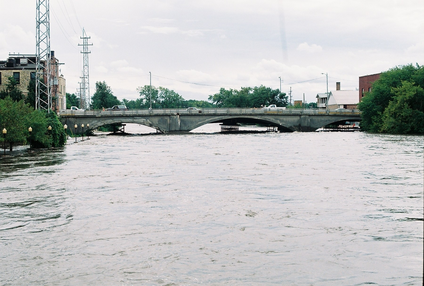 Flooded bridge over river