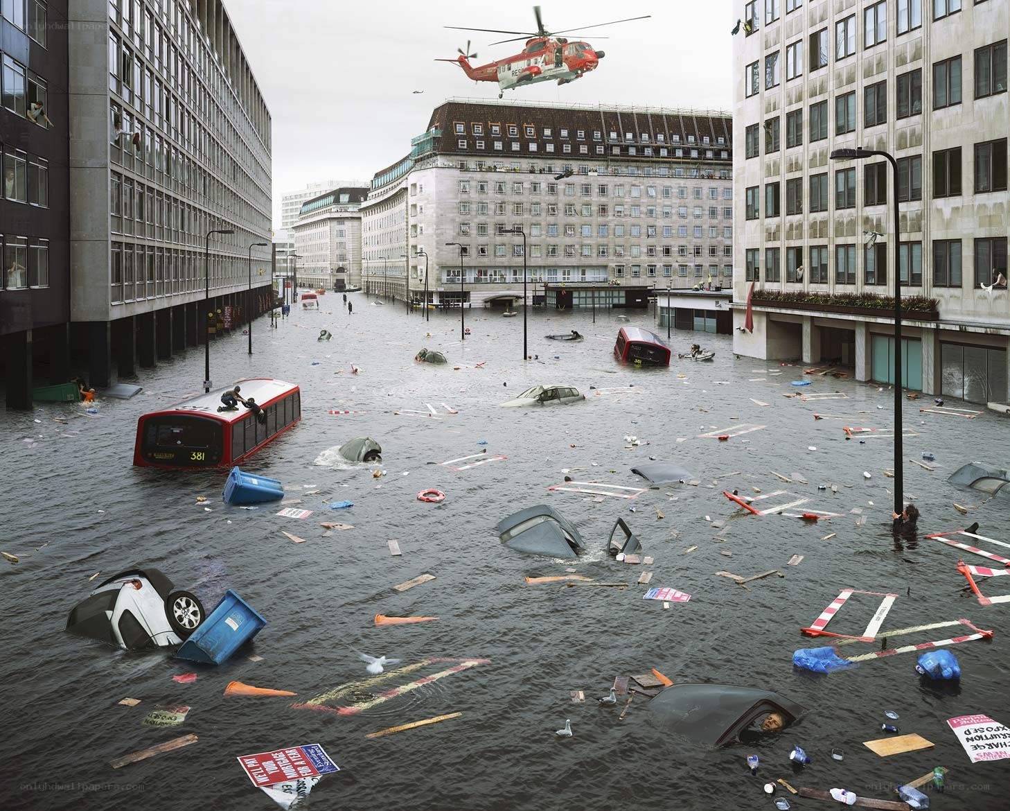 Flooded city street with helicopter