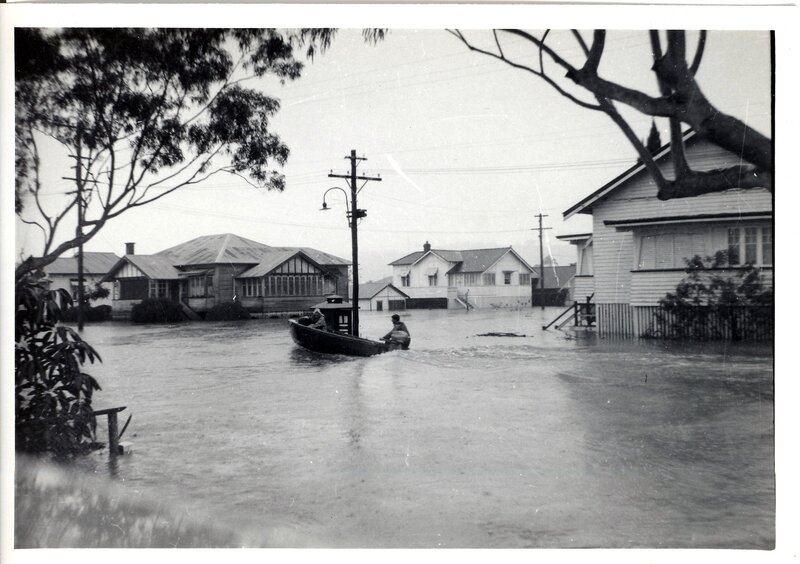Flooded residential area with boat
