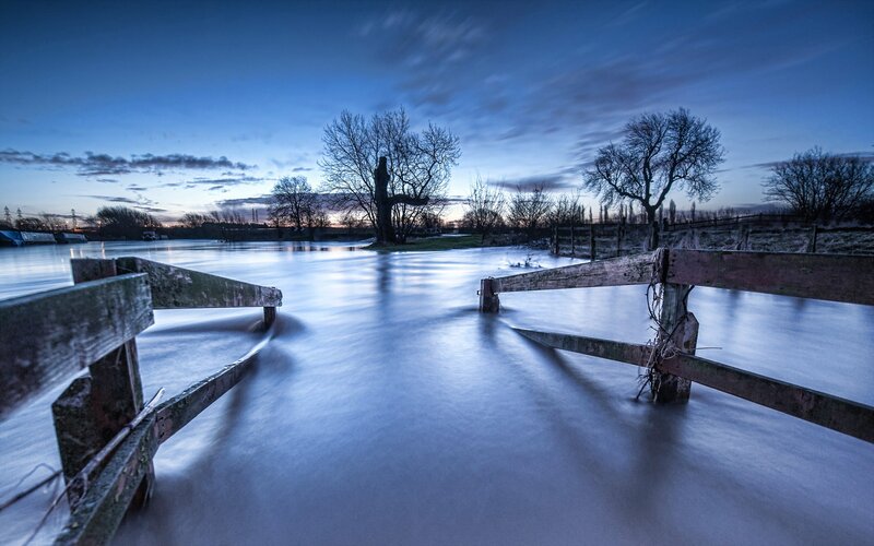 Flooded river at dusk