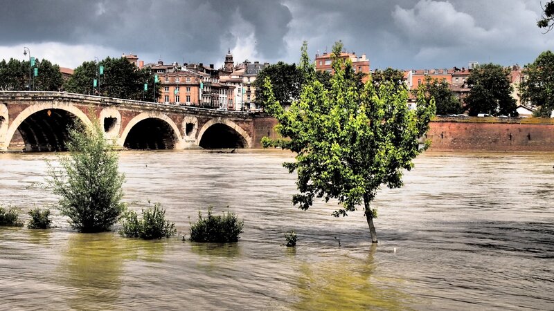 Flooded River with Bridge