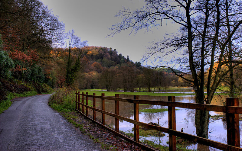 Flooded Road with Wooden Fence