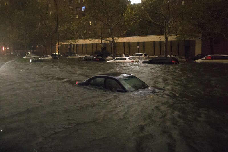 Flooded street with submerged cars