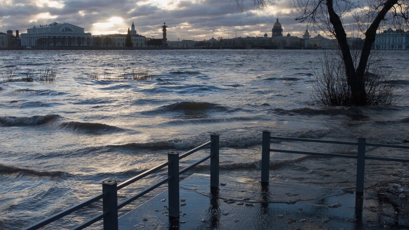 Flooded waterfront at sunset