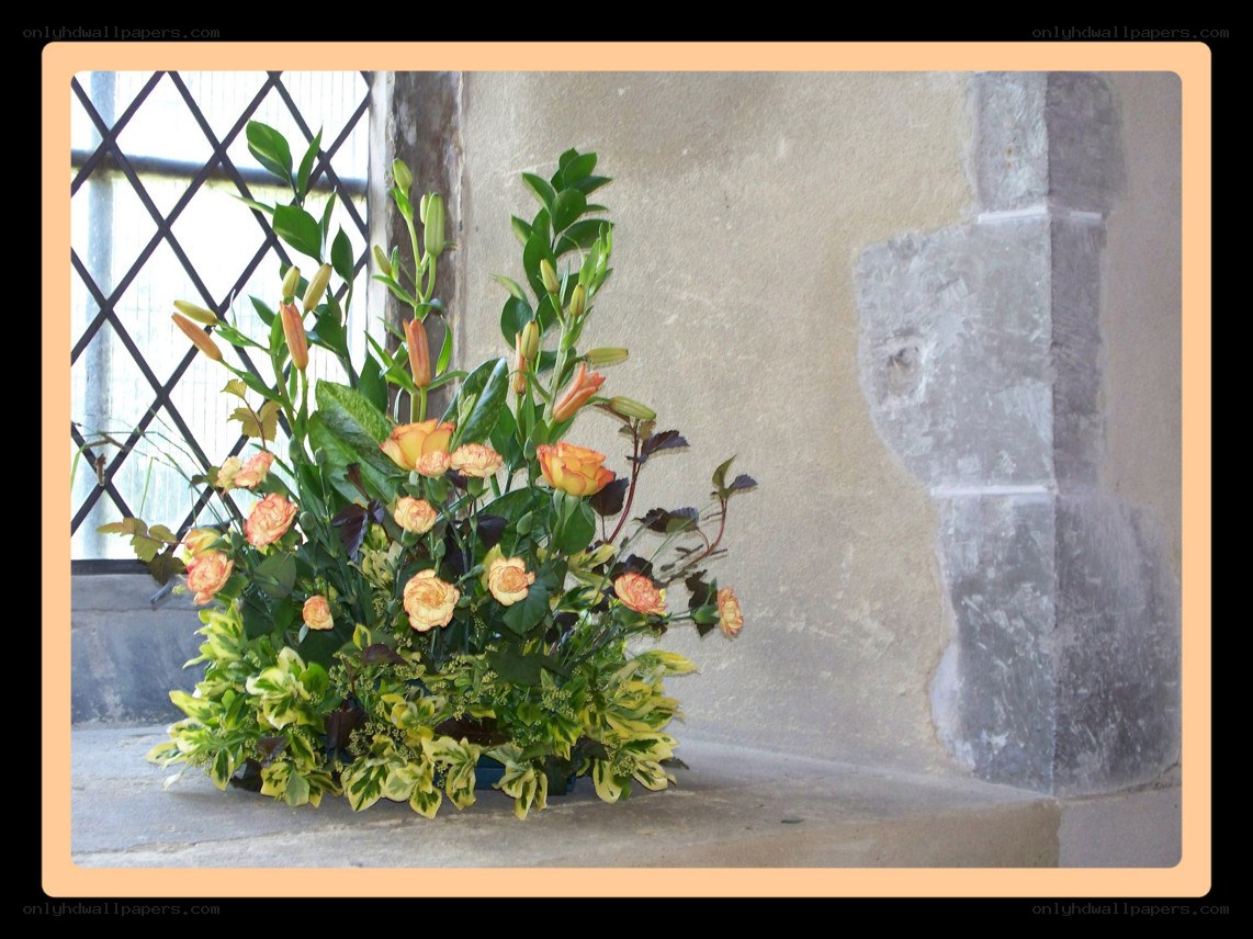 Floral arrangement by window