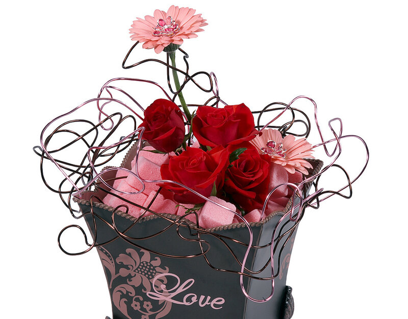 Floral arrangement in a decorative basket
