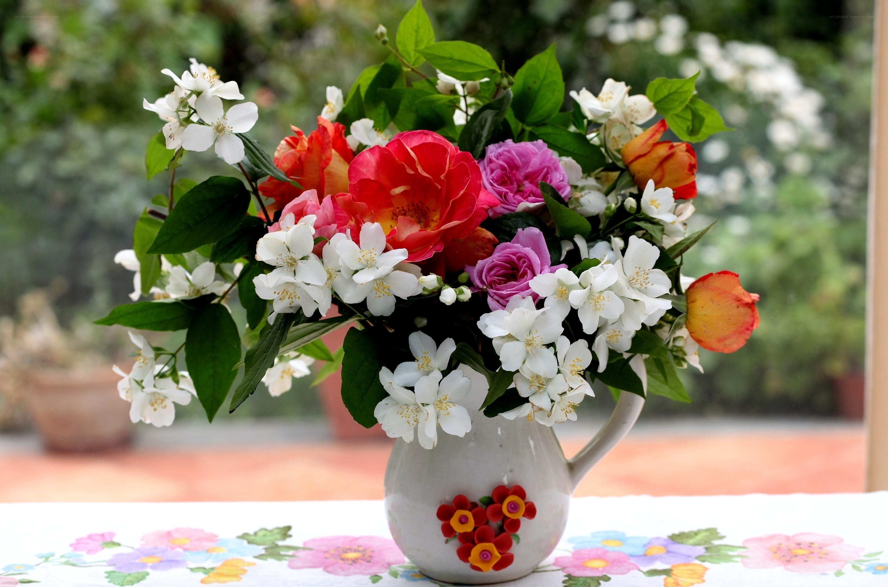Floral arrangement in a pitcher