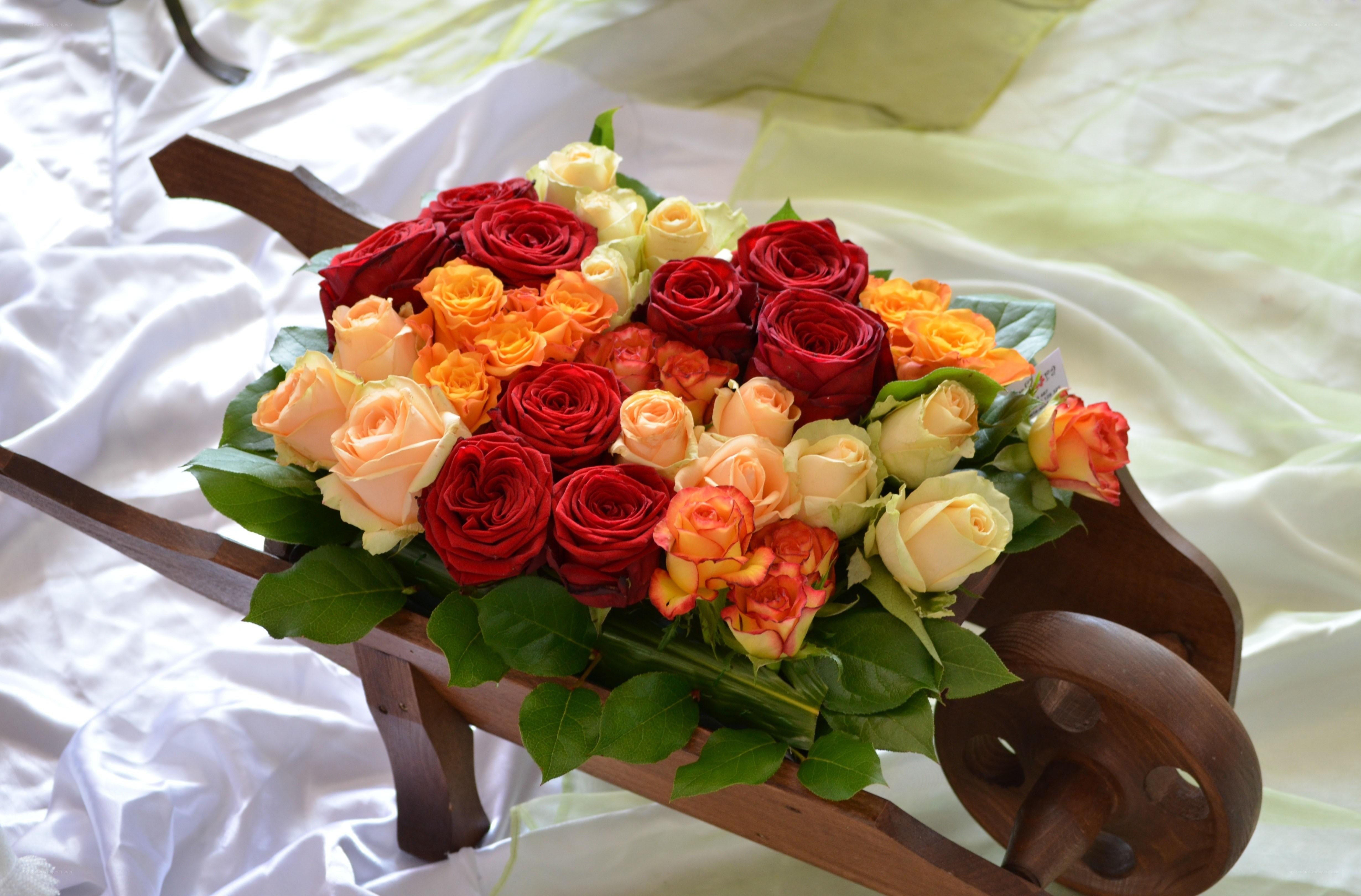 Floral arrangement in a wheelbarrow