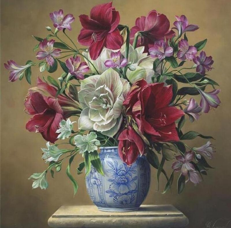 Floral arrangement in blue vase