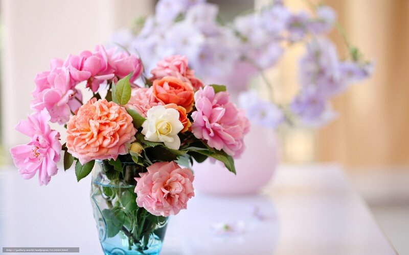 Floral arrangement in glass vase