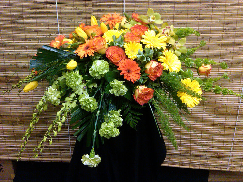 Floral Arrangement on Black Stand