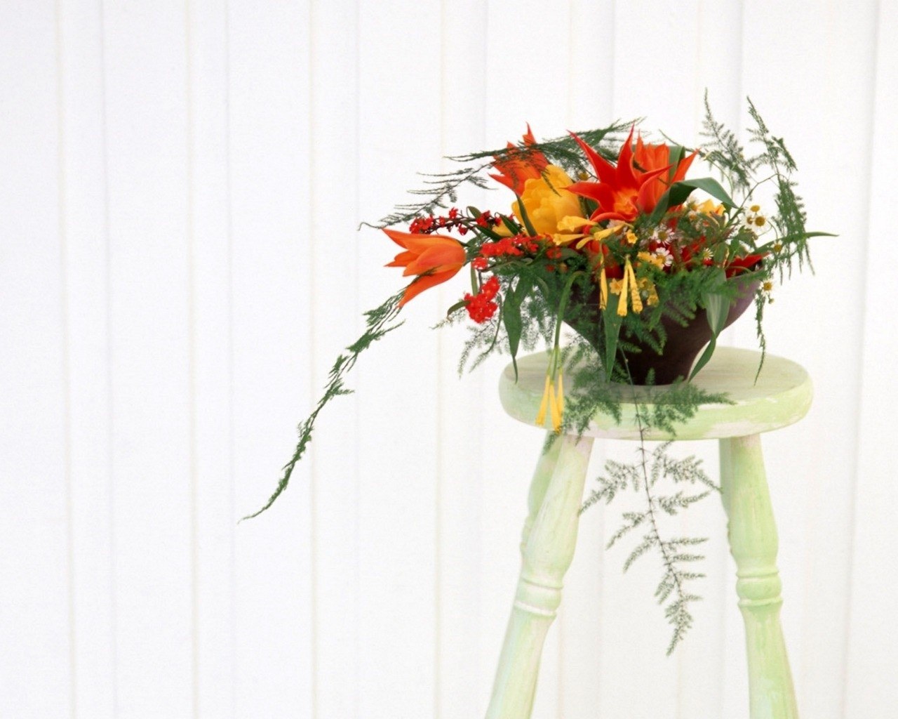 Floral arrangement on stool