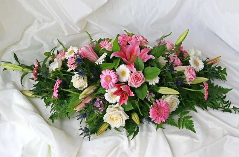 Floral Arrangement on White Cloth — Pink