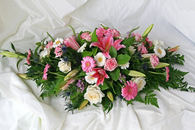 Floral Arrangement on White Cloth
