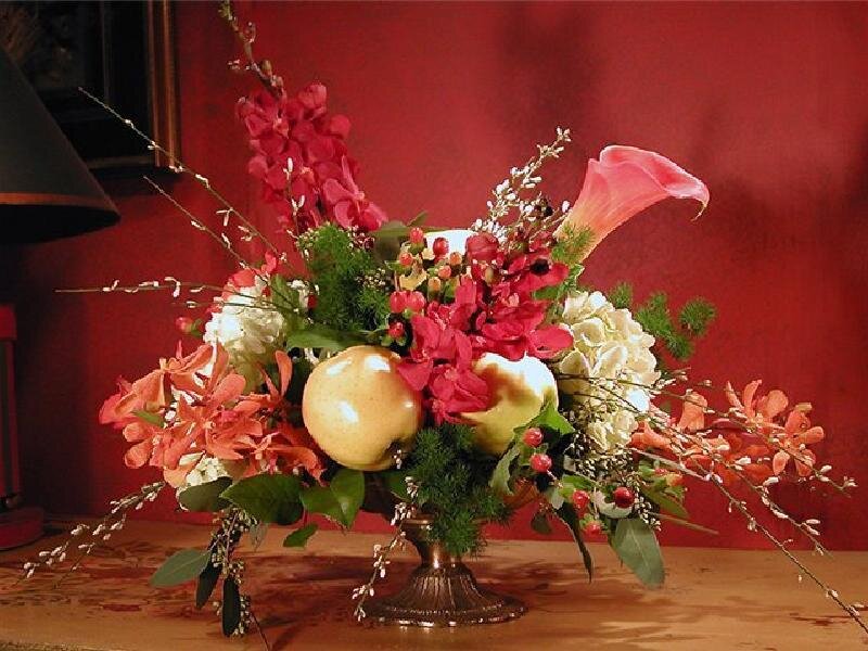Floral arrangement with apples
