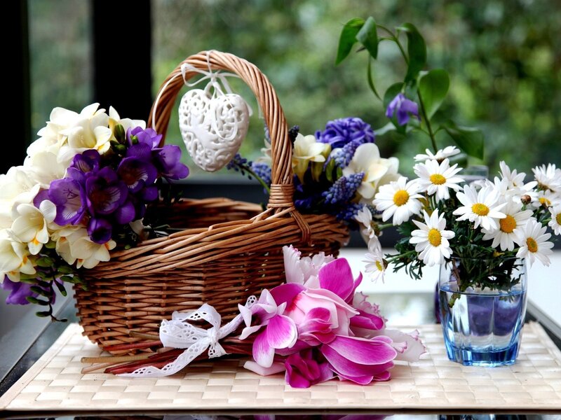 Floral arrangement with basket