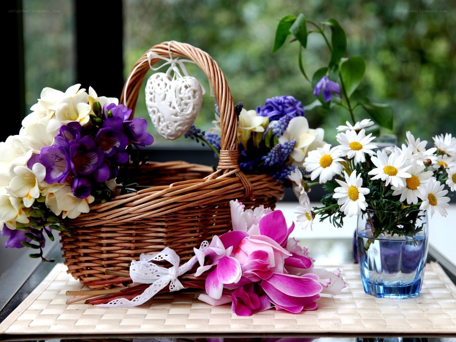 Floral arrangement with basket