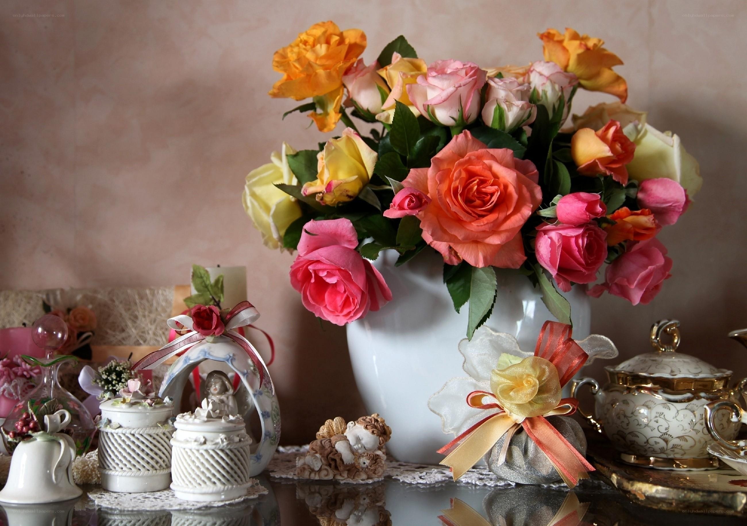 Floral arrangement with decorative items