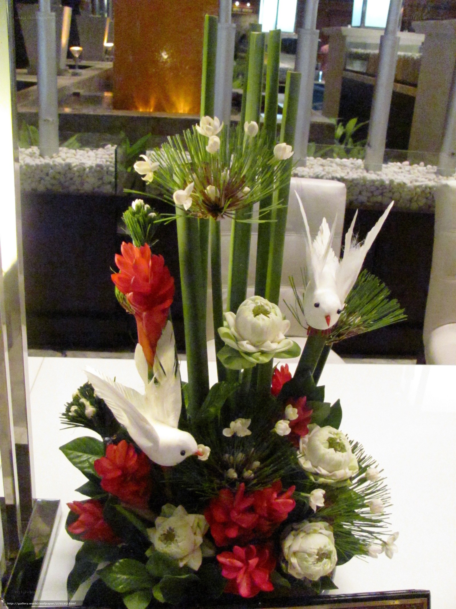 Floral arrangement with doves