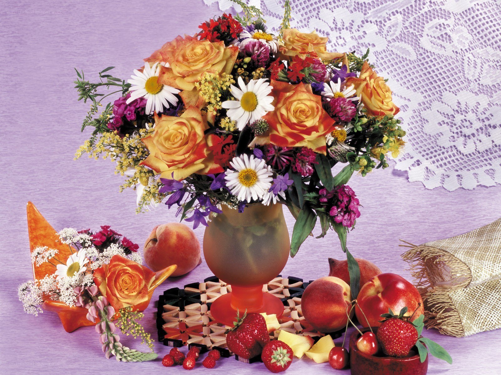 Floral arrangement with fruit
