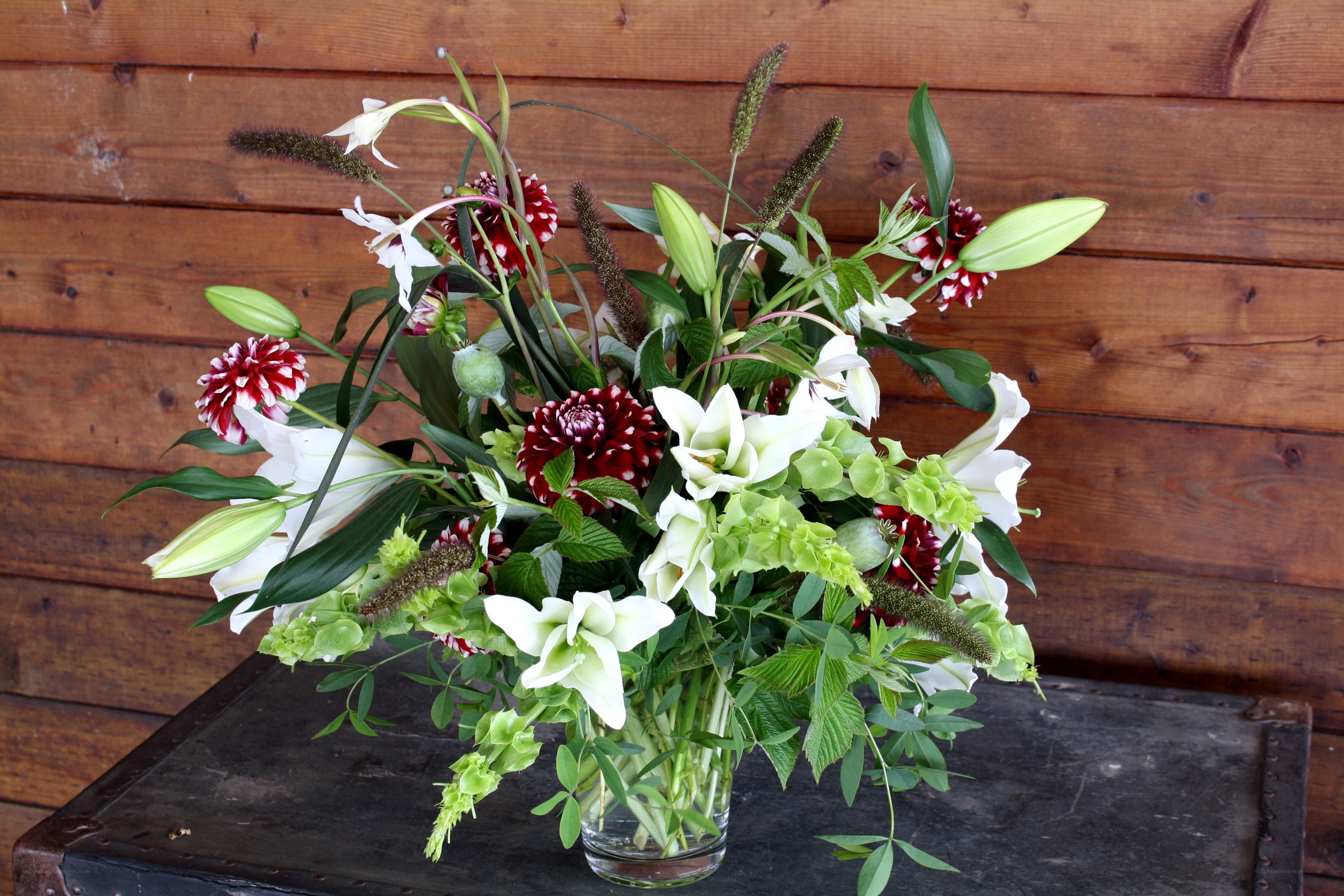 Floral arrangement with lilies and dahlias