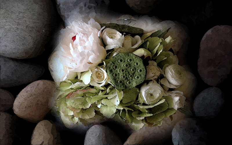 Floral arrangement with lotus pod