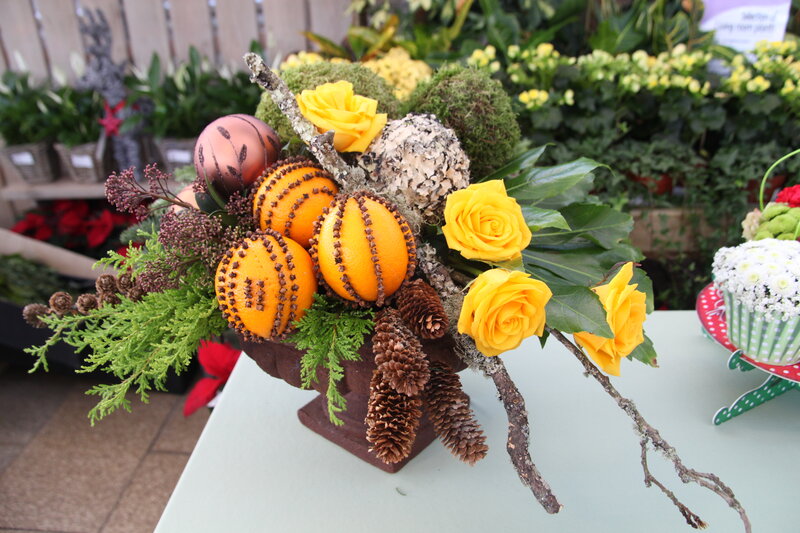 Floral Arrangement with Oranges