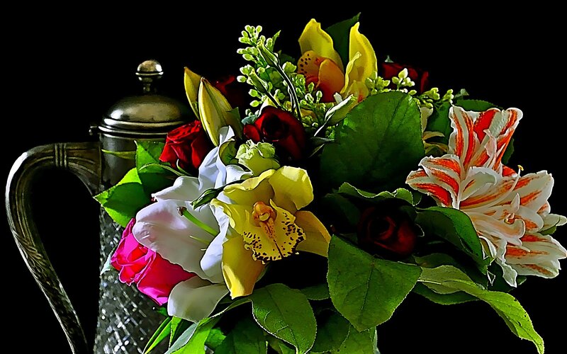 Floral arrangement with pitcher