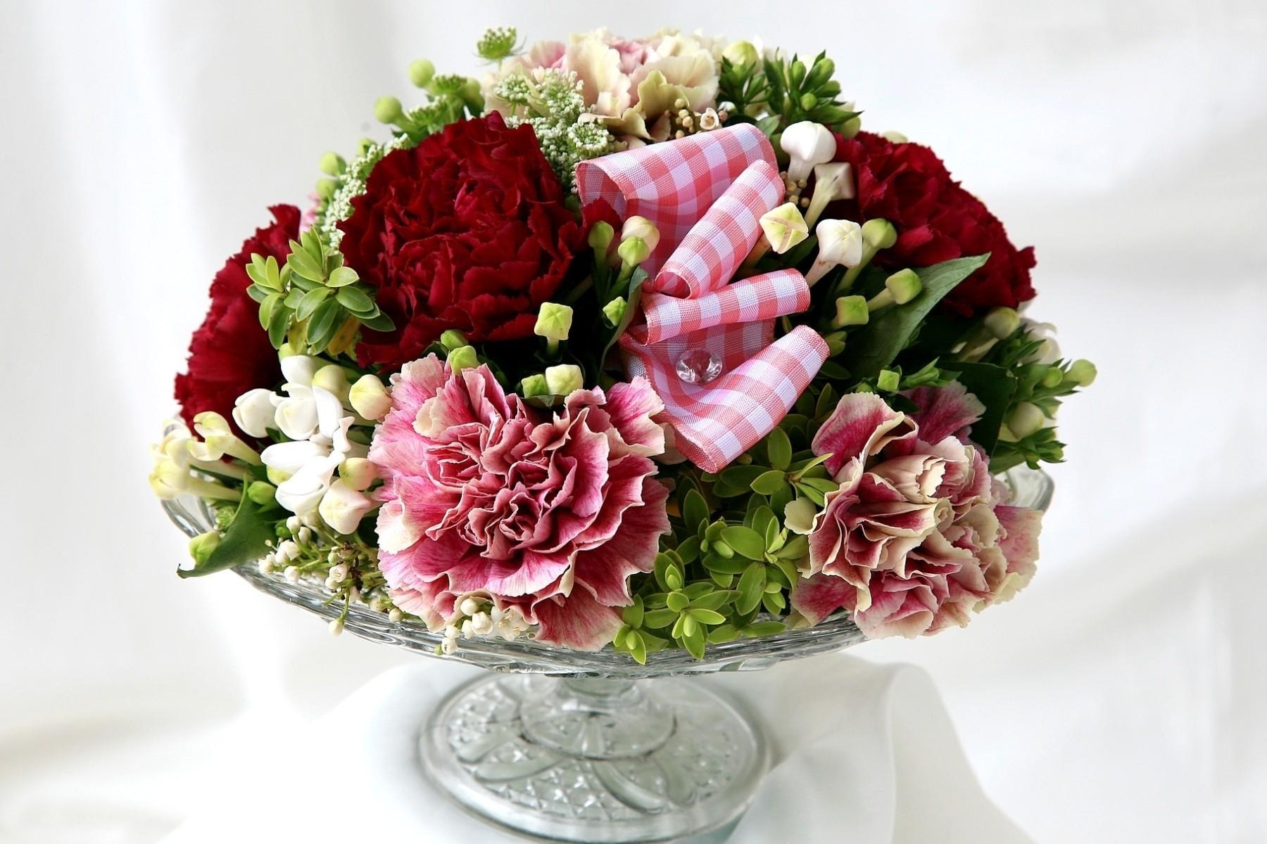 Floral arrangement with ribbon