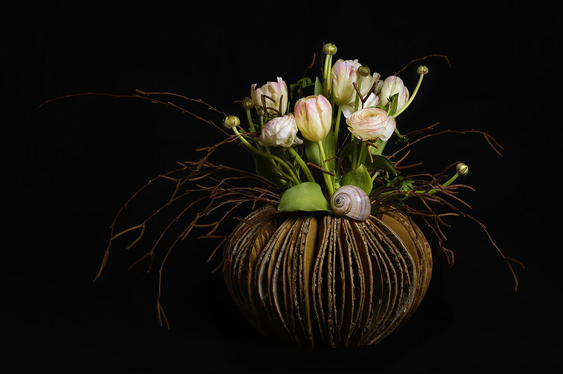 Floral arrangement with seashell