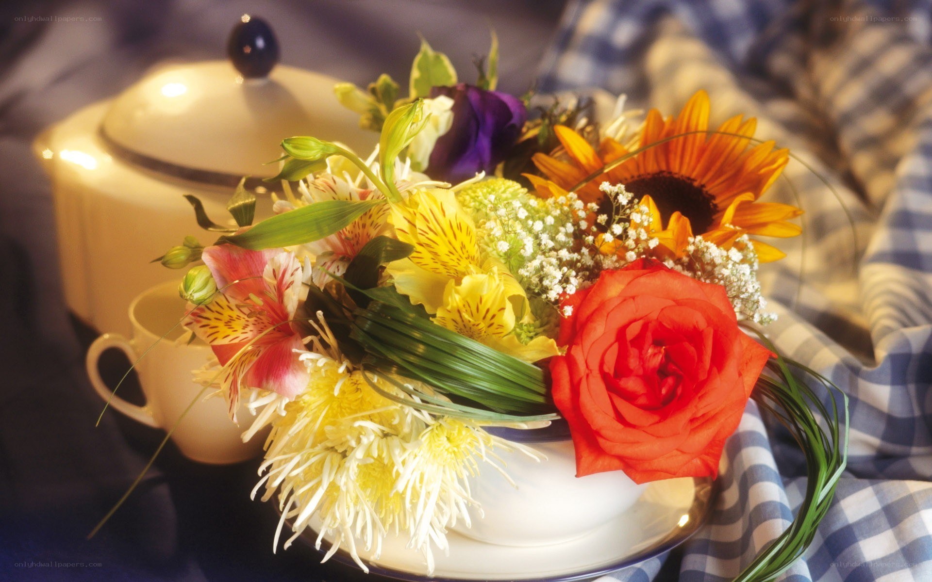 Floral arrangement with tea set