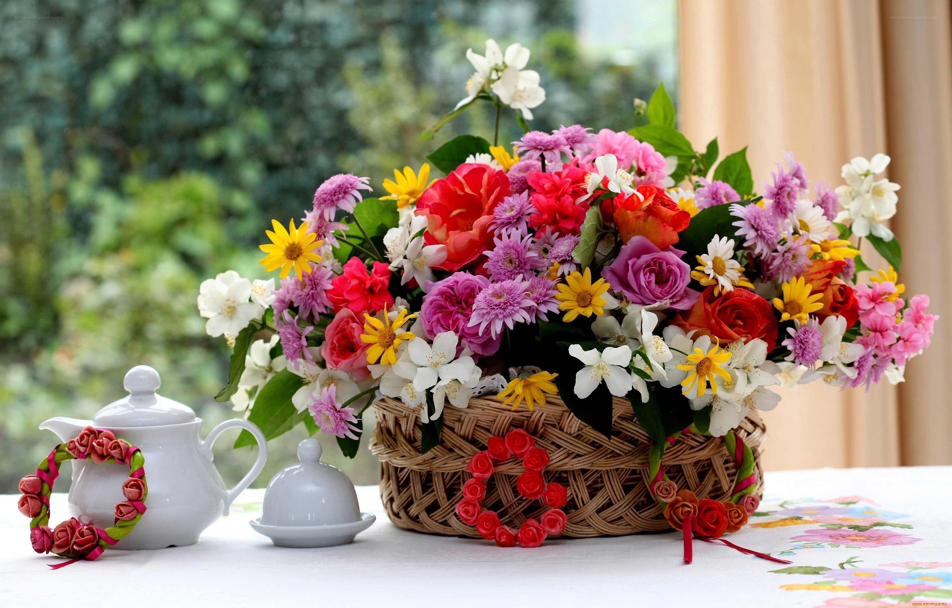 Floral arrangement with tea set