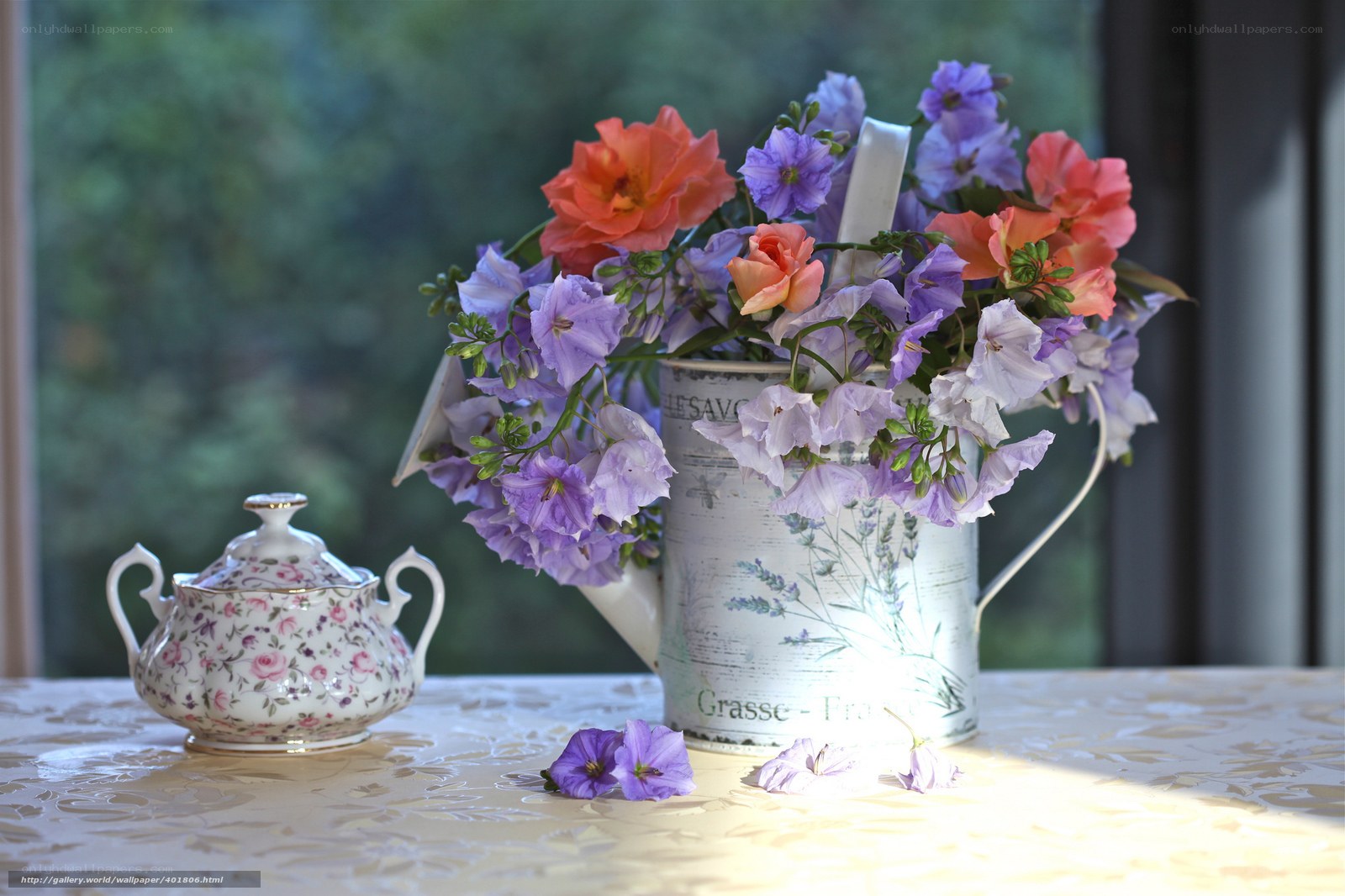 Floral arrangement with teapot