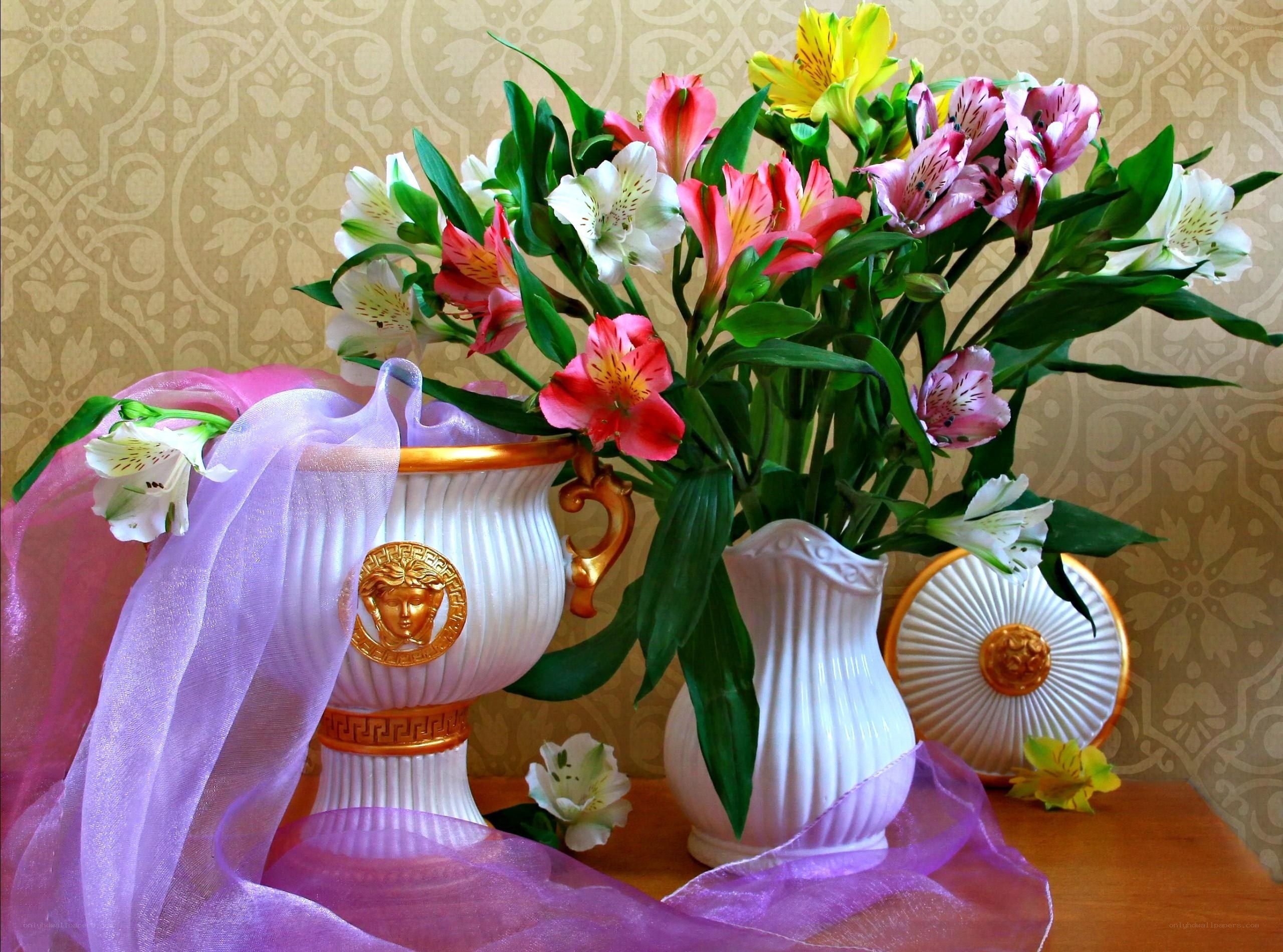 Floral arrangement with vases