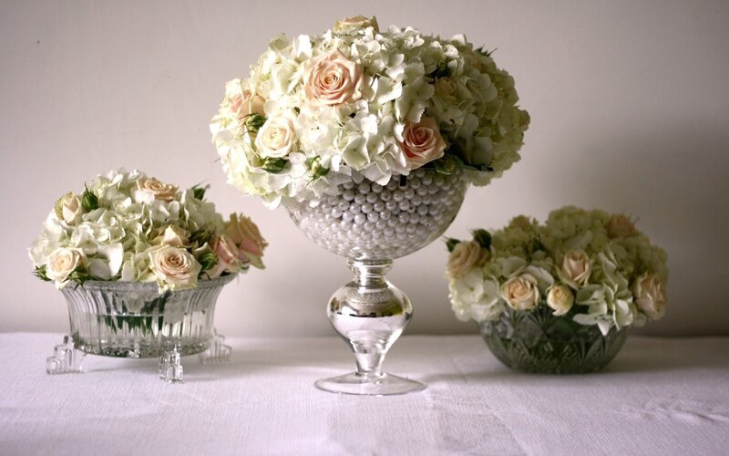Floral arrangements in glass vases