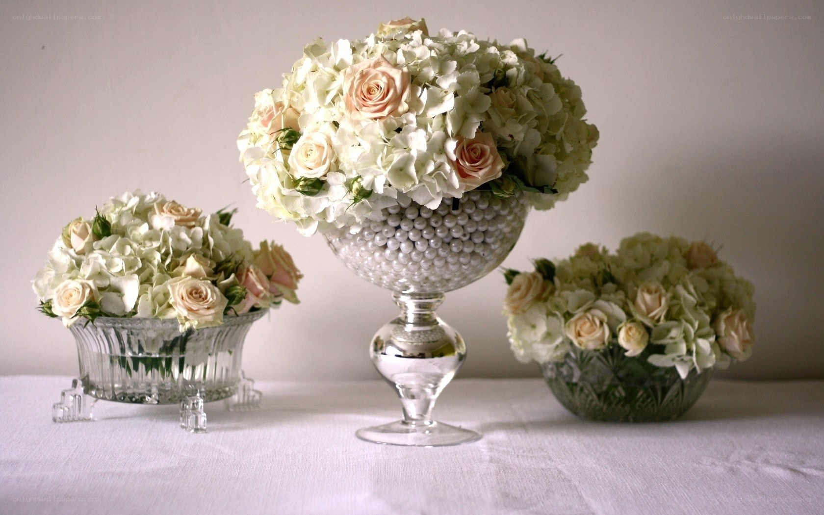 Floral arrangements in glass vases