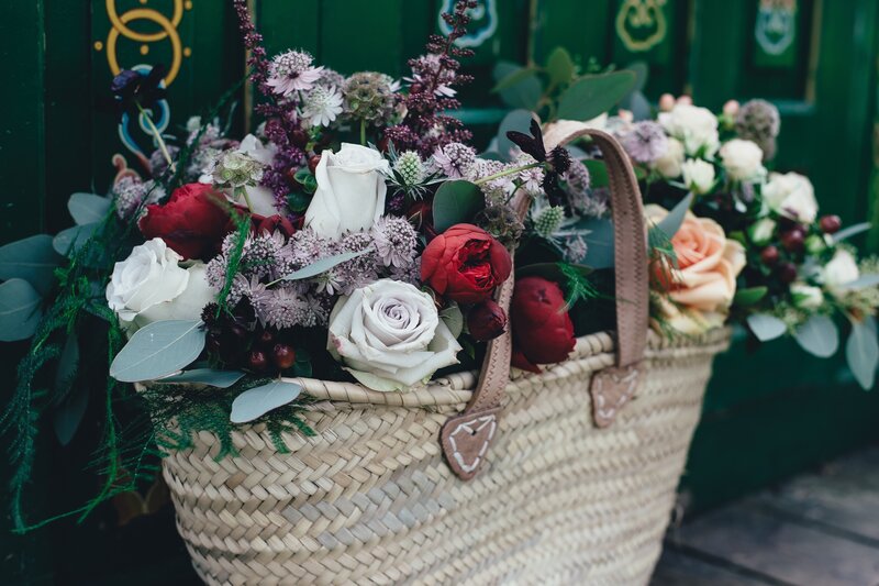 Floral bouquet in a woven basket