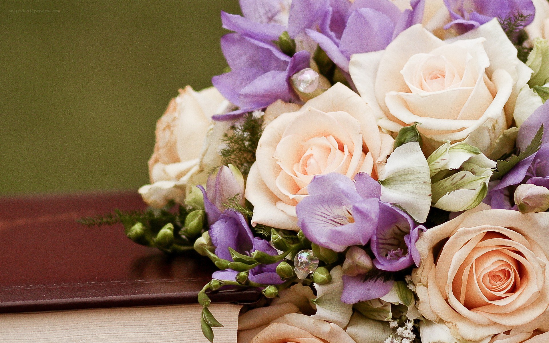 Floral bouquet on book
