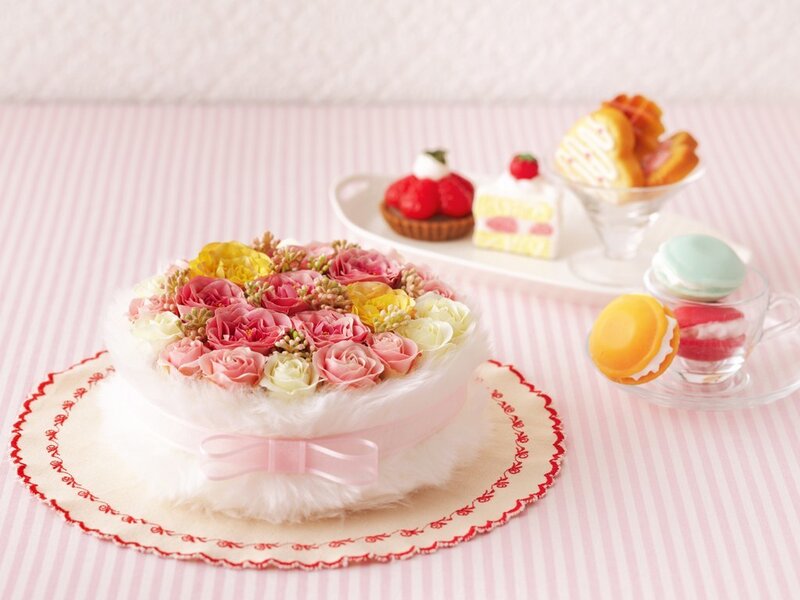 Floral cake with pastries