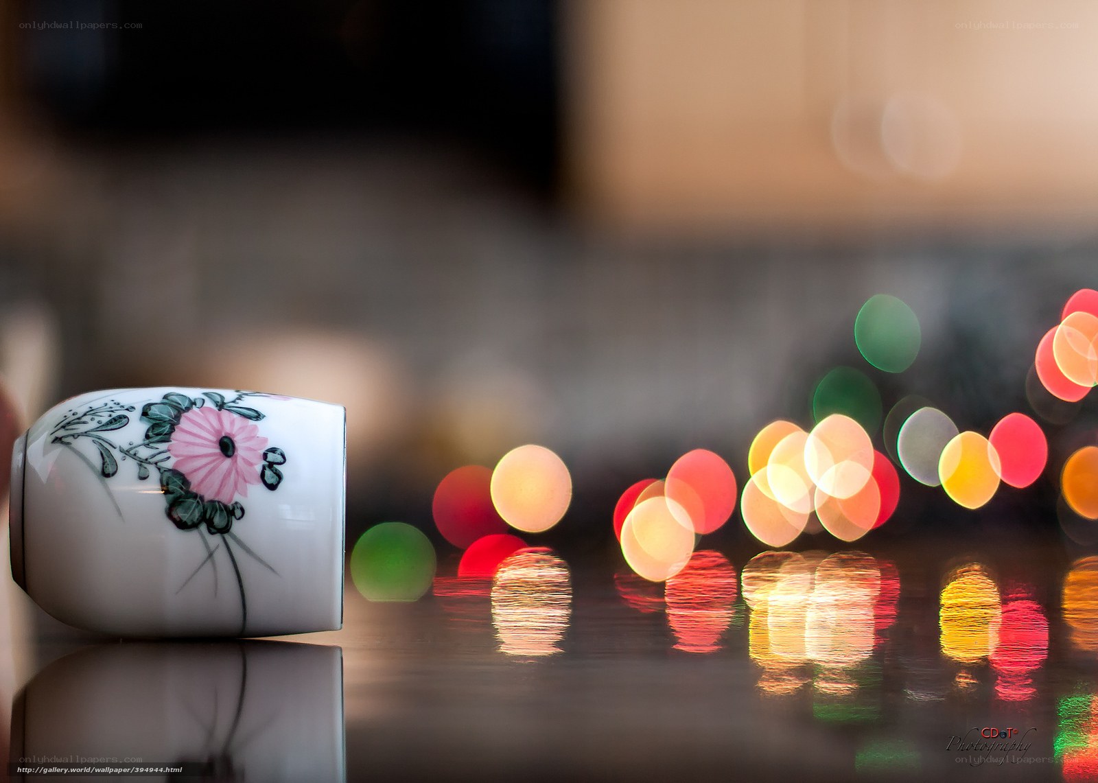 Floral cup with city lights